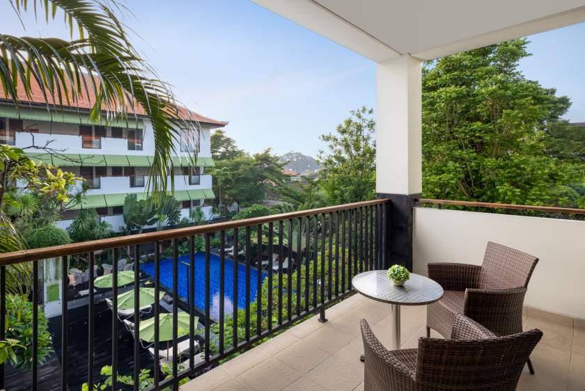 Junior Suite Balcony Pool View with railing balcony.jpg